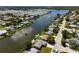 Aerial view of home on the waterfront at 2248 Society Dr, Holiday, FL 34691