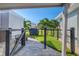 Private backyard with a grill and paver patio at 142 Beach Ave, Redington Shores, FL 33708