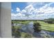 Scenic view of the golf course and water at 1200 Country Club Dr # 2505, Largo, FL 33771