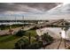 Aerial view showcasing the community's location near a bridge and waterfront at 100 Bluff View Dr # 405C, Belleair Bluffs, FL 33770