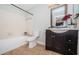 Well-maintained bathroom with tiled shower/tub, vanity with sink, and neutral decor at 100 Bluff View Dr # 405C, Belleair Bluffs, FL 33770