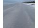 A view of the sandy shoreline and ocean waves, offering a serene beachside escape at 100 Bluff View Dr # 405C, Belleair Bluffs, FL 33770