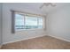 Bright bedroom with large windows that overlook the scenic bay and the surrounding community at 100 Bluff View Dr # 405C, Belleair Bluffs, FL 33770