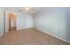 Bright bedroom features neutral walls, tiled floors, and a fan to keep the room comfortable at 100 Bluff View Dr # 405C, Belleair Bluffs, FL 33770