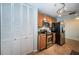 Updated kitchen with stainless steel appliances and wood cabinets at 100 Bluff View Dr # 405C, Belleair Bluffs, FL 33770