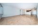 Bright living room featuring tile floors and windows offering natural light at 100 Bluff View Dr # 405C, Belleair Bluffs, FL 33770