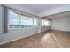 This living room is spacious and bright, offering incredible bay views at 100 Bluff View Dr # 405C, Belleair Bluffs, FL 33770