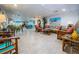 Spacious building community lounge area featuring ample seating and stylish decor at 100 Bluff View Dr # 405C, Belleair Bluffs, FL 33770