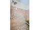 New shower with tiled walls, multiple shower heads and built-in bench at 100 Bluff View Dr # 405C, Belleair Bluffs, FL 33770