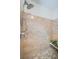Walk-in shower with tiled walls and built-in seat at 100 Bluff View Dr # 405C, Belleair Bluffs, FL 33770