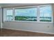 Lovely waterfront view featuring large windows offering bright and expansive views at 100 Bluff View Dr # 405C, Belleair Bluffs, FL 33770