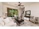 Bright living room with comfortable seating and sliding glass doors to the outdoor area at 17860 Althea Blue Pl, Lutz, FL 33558