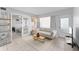 Living room with staged furniture and view of bedroom at 1840 Shore S Dr # 5, South Pasadena, FL 33707