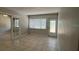Living room with French doors and access to outdoors at 1840 Shore S Dr # 5, South Pasadena, FL 33707