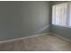 Empty bedroom with light-grey walls and tile floors at 1840 Shore S Dr # 5, South Pasadena, FL 33707