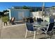 Outdoor patio with seating area and storage at 1840 Shore S Dr # 5, South Pasadena, FL 33707