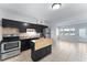 Kitchen with stainless steel appliances and an island at 1840 Shore S Dr # 5, South Pasadena, FL 33707
