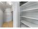 Well-organized pantry with adjustable shelving at 1840 Shore S Dr # 5, South Pasadena, FL 33707