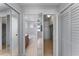 Clean bathroom with bathtub, vanity, and mirrored closet at 1840 Shore S Dr # 5, South Pasadena, FL 33707