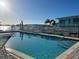 Refreshing community pool with ample lounge space at 1840 Shore S Dr # 5, South Pasadena, FL 33707