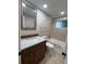 Clean bathroom with a vanity, tub, and shower at 1840 Shore S Dr # 5, South Pasadena, FL 33707
