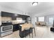 Kitchen with stainless steel appliances and an island at 1840 Shore S Dr # 5, South Pasadena, FL 33707