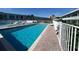 Inviting community pool with surrounding patio at 1840 Shore S Dr # 5, South Pasadena, FL 33707