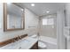 Updated bathroom with a vanity, tub, and shower at 1840 Shore S Dr # 5, South Pasadena, FL 33707