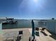 Scenic waterfront view with patio seating at 1840 Shore S Dr # 5, South Pasadena, FL 33707