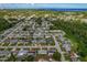 Wide aerial view of neighborhood with highlighted single-Gathering home at 3320 Binder Dr, Holiday, FL 34691