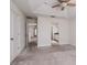 Main bedroom with access to bathroom and hallway at 17860 Althea Blue Pl, Lutz, FL 33558