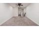 Spacious loft area with carpeted floor at 17860 Althea Blue Pl, Lutz, FL 33558