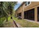 Exterior of building with private backyard space at 17860 Althea Blue Pl, Lutz, FL 33558