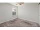 Spacious bedroom with neutral walls and carpet at 17860 Althea Blue Pl, Lutz, FL 33558