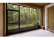 Screened patio with access to wooded area at 17860 Althea Blue Pl, Lutz, FL 33558