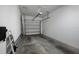 Garage with overhead door and ample storage space at 17860 Althea Blue Pl, Lutz, FL 33558