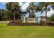 Lakeshore Preserve community entrance with landscaping and signage at 17860 Althea Blue Pl, Lutz, FL 33558
