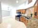 Bright kitchen featuring stainless steel appliances and granite countertops at 31207 Chatterly Dr, Wesley Chapel, FL 33543