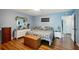 Primary bedroom with king-size bed and ample closet space at 2430 Brazilia Dr # 24, Clearwater, FL 33763