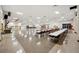 Large community room with tables and chairs for events at 2430 Brazilia Dr # 24, Clearwater, FL 33763