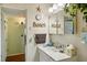 Bathroom with vanity, sink, and decorative accents at 2430 Brazilia Dr # 24, Clearwater, FL 33763