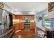 Kitchen features stainless steel appliances and wood cabinets at 2430 Brazilia Dr # 24, Clearwater, FL 33763