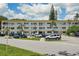 Front view of a two-story building with parking at 2430 Brazilia Dr # 24, Clearwater, FL 33763