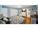 Primary bedroom with walk-in closet and bathroom access at 2430 Brazilia Dr # 24, Clearwater, FL 33763