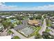 Community view showing clubhouse, pool, tennis and shuffleboard at 2430 Brazilia Dr # 24, Clearwater, FL 33763