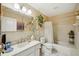 Clean bathroom with a bathtub, shower, and updated vanity at 2430 Brazilia Dr # 24, Clearwater, FL 33763