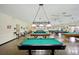 Spacious game room featuring several pool tables at 2430 Brazilia Dr # 24, Clearwater, FL 33763