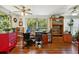 Home office with two workstations and abundant natural light at 2430 Brazilia Dr # 24, Clearwater, FL 33763