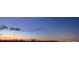 Stunning sunset view over the water and city skyline at 50 Coe Rd # 125, Belleair, FL 33756