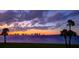 Stunning sunset view over the water with city skyline in the distance at 50 Coe Rd # 125, Belleair, FL 33756